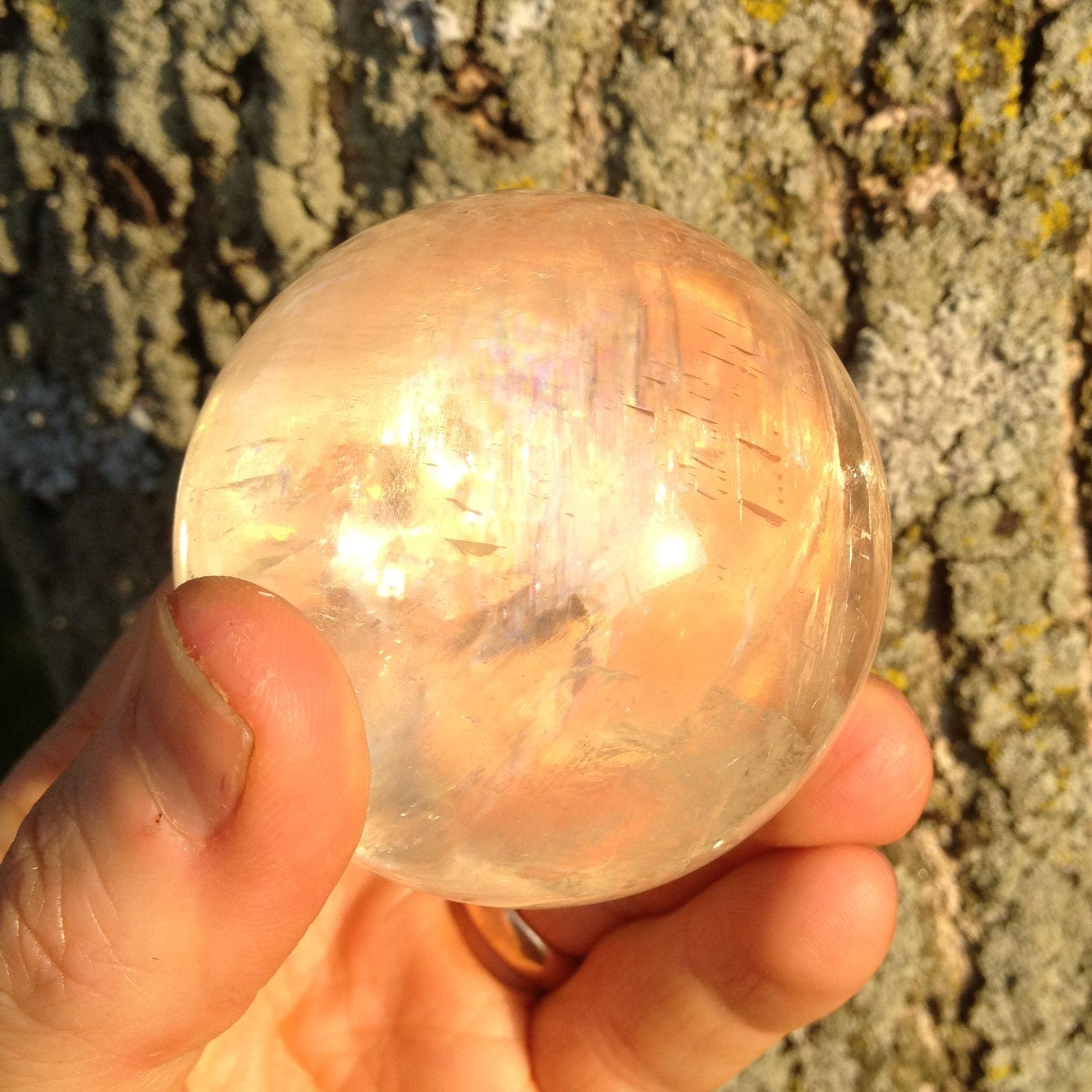 a decent sphere - like this golden rainbow Calcite sphere - should cost over $100